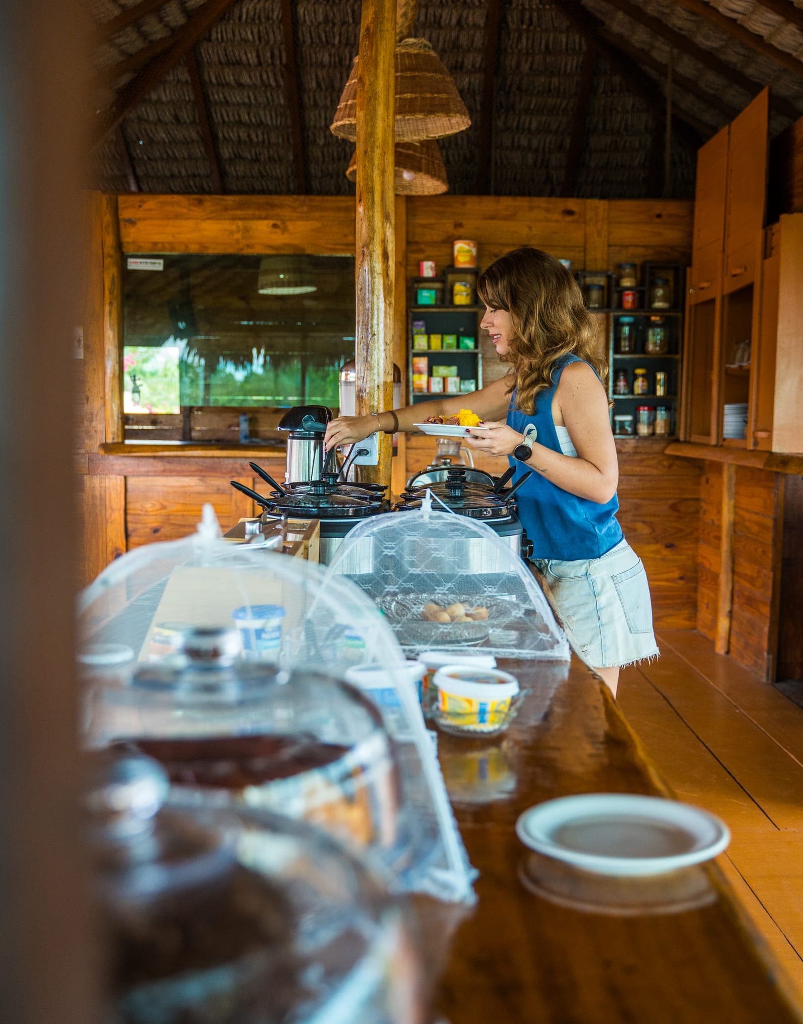Guest serving herself at breakfast