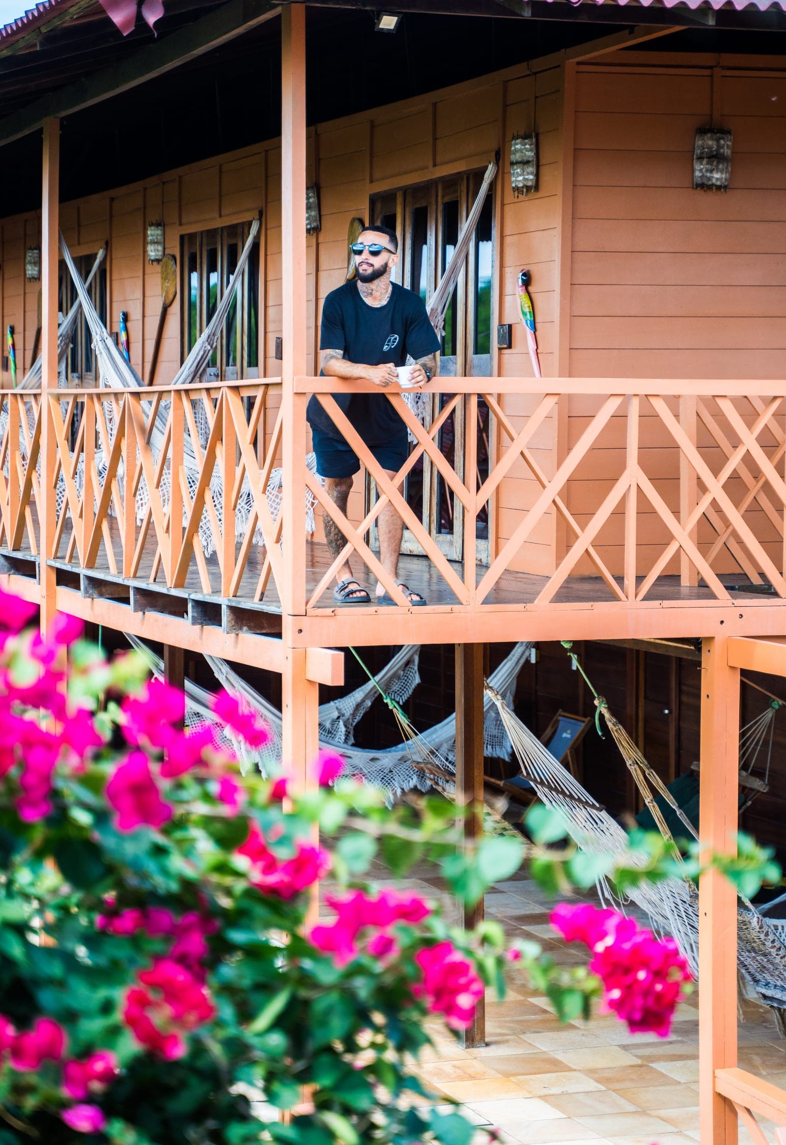 Guest on the upper veranda with hammocks